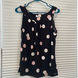 Polka dot sleeveless blouse